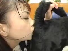 Petite juvenile Asian housewife in uniform licks dog gazoo after she's bent over and drilled in this clip 